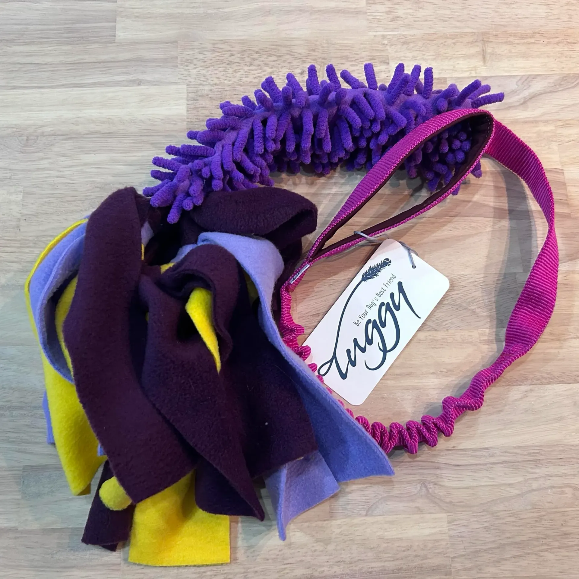 Tuggy - Noppy tug met fleece strepen